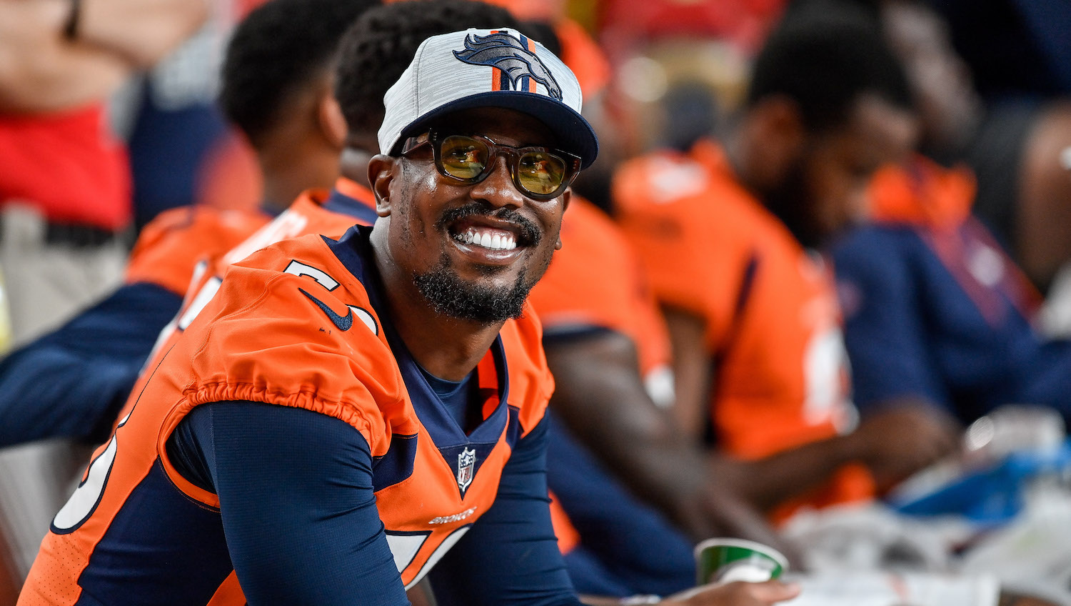 DENVER, CO - AUGUST 28: Von Miller #58 of the Denver Broncos looks on in the bench area during an NFL preseason game against the Los Angeles Rams at Empower Field at Mile High on August 28, 2021 in Denver, Colorado. (Photo by Dustin Bradford/Getty Images)