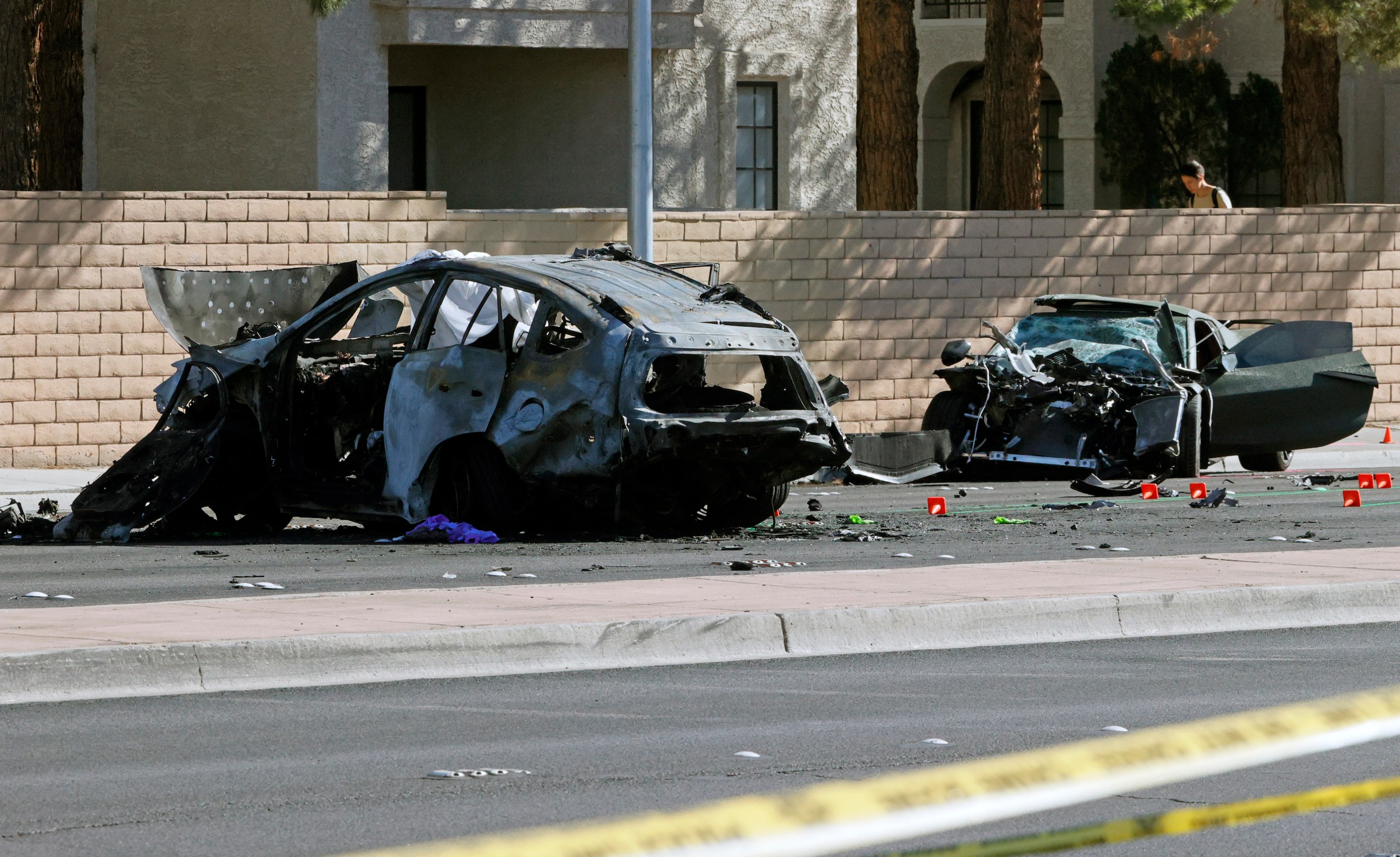 A Toyota RAV4 at left and a Chevrolet Corvette that were involved in a fatal accident are shown on November 2, 2021 in Las Vegas, Nevada. According to the Las Vegas Metropolitan Police Department, the Corvette was being driven by wide receiver Henry Ruggs III of the NFL Las Vegas Raiders when it hit the RAV4, killing a woman.