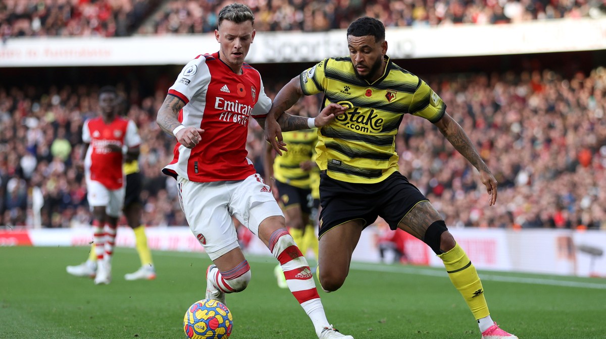 Ben White of Arsenal battles for possession with Joshua King of Watford FC during the Premier League match between Arsenal and Watford at Emirates Stadium on November 07, 2021 in London, England.