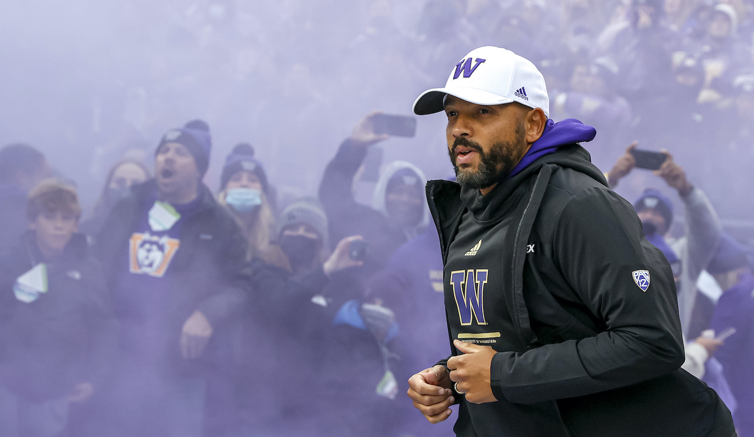 SEATTLE, WASHINGTON - NOVEMBER 06: Head coach Jimmy Lake of the Washington Huskies takes the field before the game against the Oregon Ducks at Husky Stadium on November 06, 2021 in Seattle, Washington. (Photo by Steph Chambers/Getty Images)