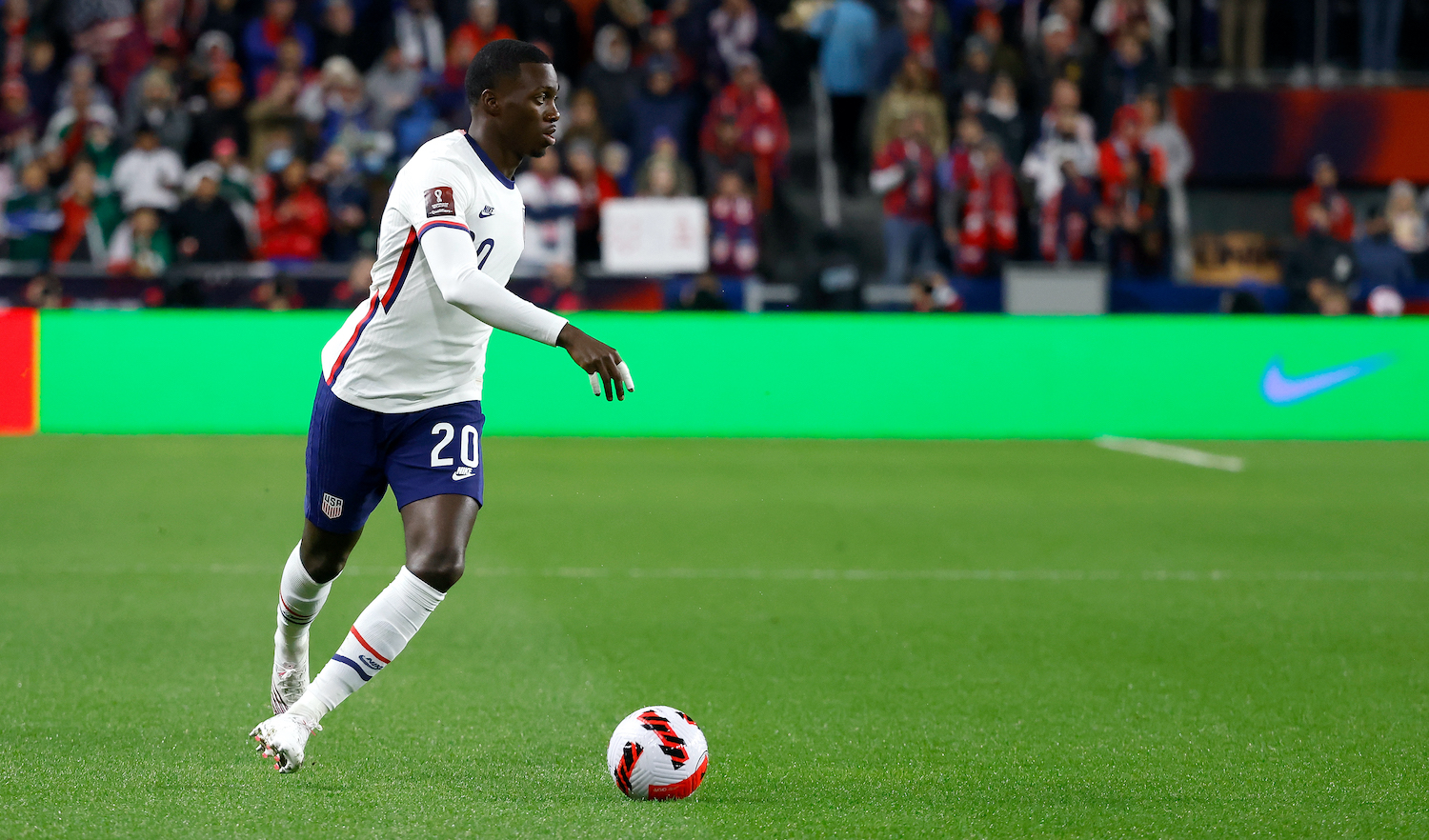CINCINNATI, OH - NOVEMBER 12: Tim Weah #20 of the United States controls the ball during the FIFA World Cup 2022 Qualifier match against Mexico at TQL Stadium on November 12, 2021 in Cincinnati, Ohio. (Photo by Kirk Irwin/Getty Images)