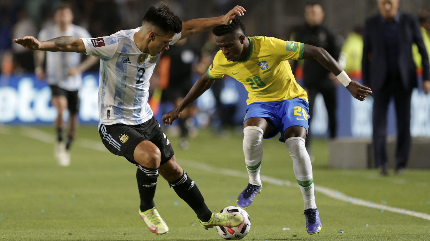 Lisandro Martínez of Argentina competes for the ball with Vinicius Junior of Brazil during a match between Argentina and Brazil as part of FIFA World Cup Qatar 2022 Qualifiers at San Juan del Bicentenario Stadium on November 16, 2021 in San Juan, Argentina.