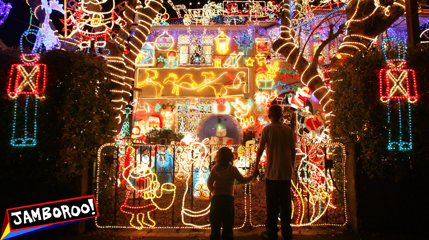 MELKSHAM, UNITED KINGDOM - DECEMBER 01: Children look at the Christmas lights displayed on a house on December 1, 2008 in Melksham, England. The householder Alex Goodwind - who says he does it to raise money for charity after his mother died a few years ago - starts planning lights in July and has spent 3,000 GBP this year alone on the lights that are now estimated to be worth 30,000 GBP. Last year the bill for electricity was 700 GBP and the house had to have an uprated electricity supply installed to cope with the additional power needed. Donations from visitors to the spectacle raised over 2,000 GBP to local hospice Dorothy House. (Photo by Matt Cardy/Getty Images)