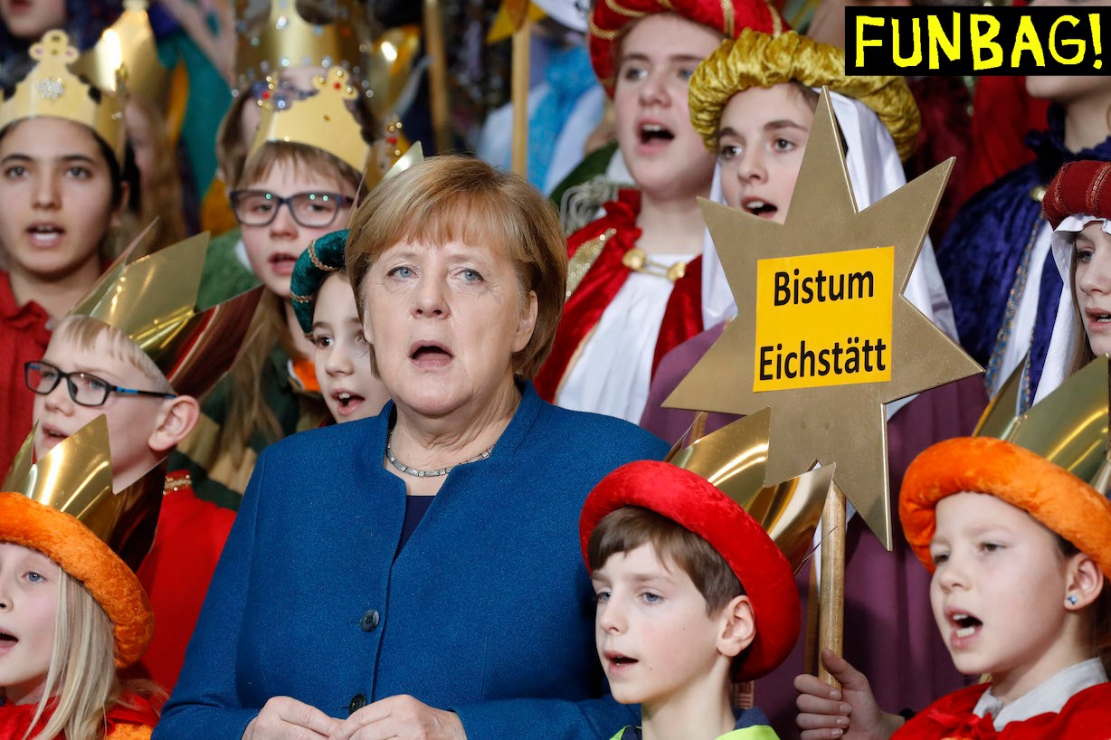 German Chancellor Angela Merkel sings with Carol Singers from across the country during a reception at the Chancellery in Berlin on January 7, 2020. - Traditionally, children dressed as the Three Kings go from house to house after Christmas and before Epiphany to collect money for charitable projects of the Roman Catholic church. (Photo by Odd ANDERSEN / AFP) (Photo by ODD ANDERSEN/AFP via Getty Images)