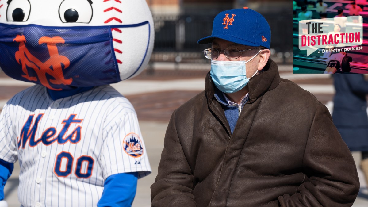 Mets owner Steve Cohen and Mets mascot Mr. Met, seen at the opening of a mass vaccination site at CitiField in February of 2021.