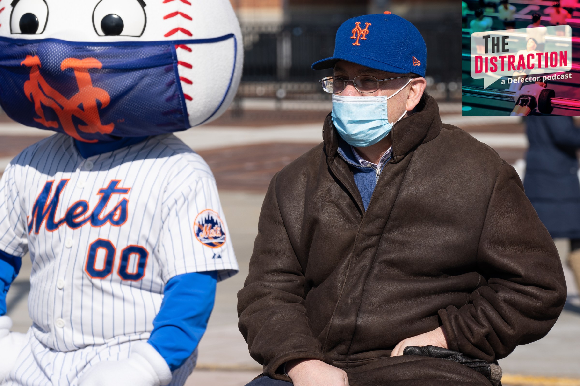 Mets owner Steve Cohen and Mets mascot Mr. Met, seen at the opening of a mass vaccination site at CitiField in February of 2021.