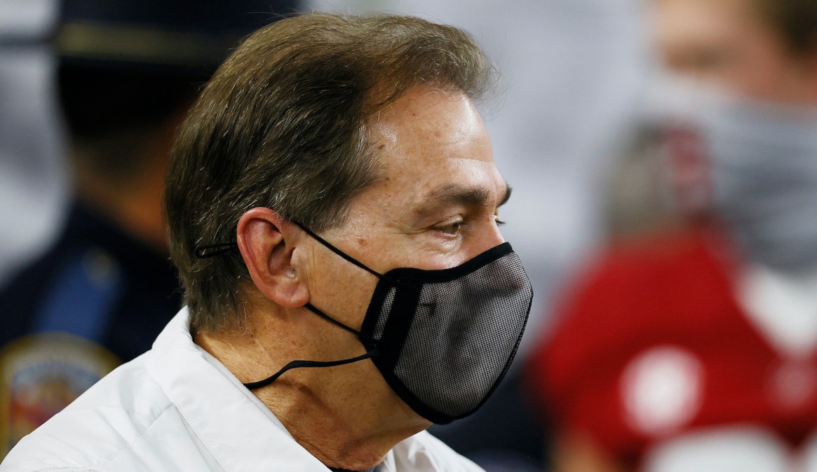 ARLINGTON, TEXAS - JANUARY 01: Head coach Nick Saban of the Alabama Crimson Tide walks on the field, masked prior to the 2021 College Football Playoff Semifinal Game at the Rose Bowl Game presented by Capital One against the Notre Dame Fighting Irish at AT&amp;T Stadium on January 01, 2021 in Arlington, Texas. (Photo by Tom Pennington/Getty Images)