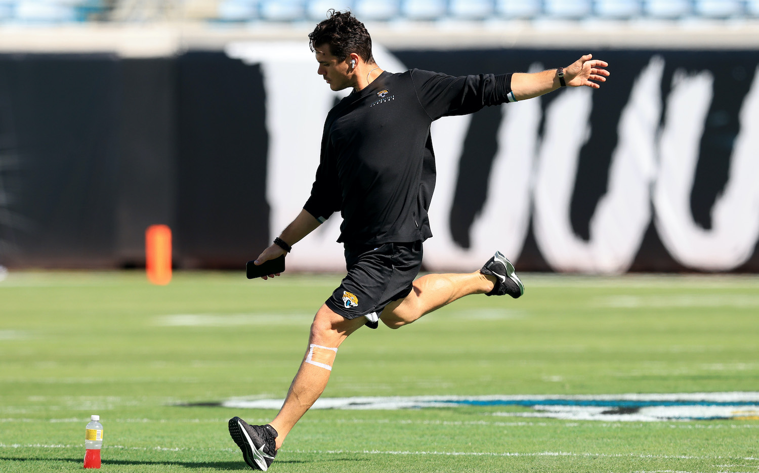 Josh Lambo #4 of the Jacksonville Jaguars warms up prior to the game against the Arizona Cardinals at TIAA Bank Field on September 26, 2021 in Jacksonville, Florida. (Photo by Sam Greenwood/Getty Images)