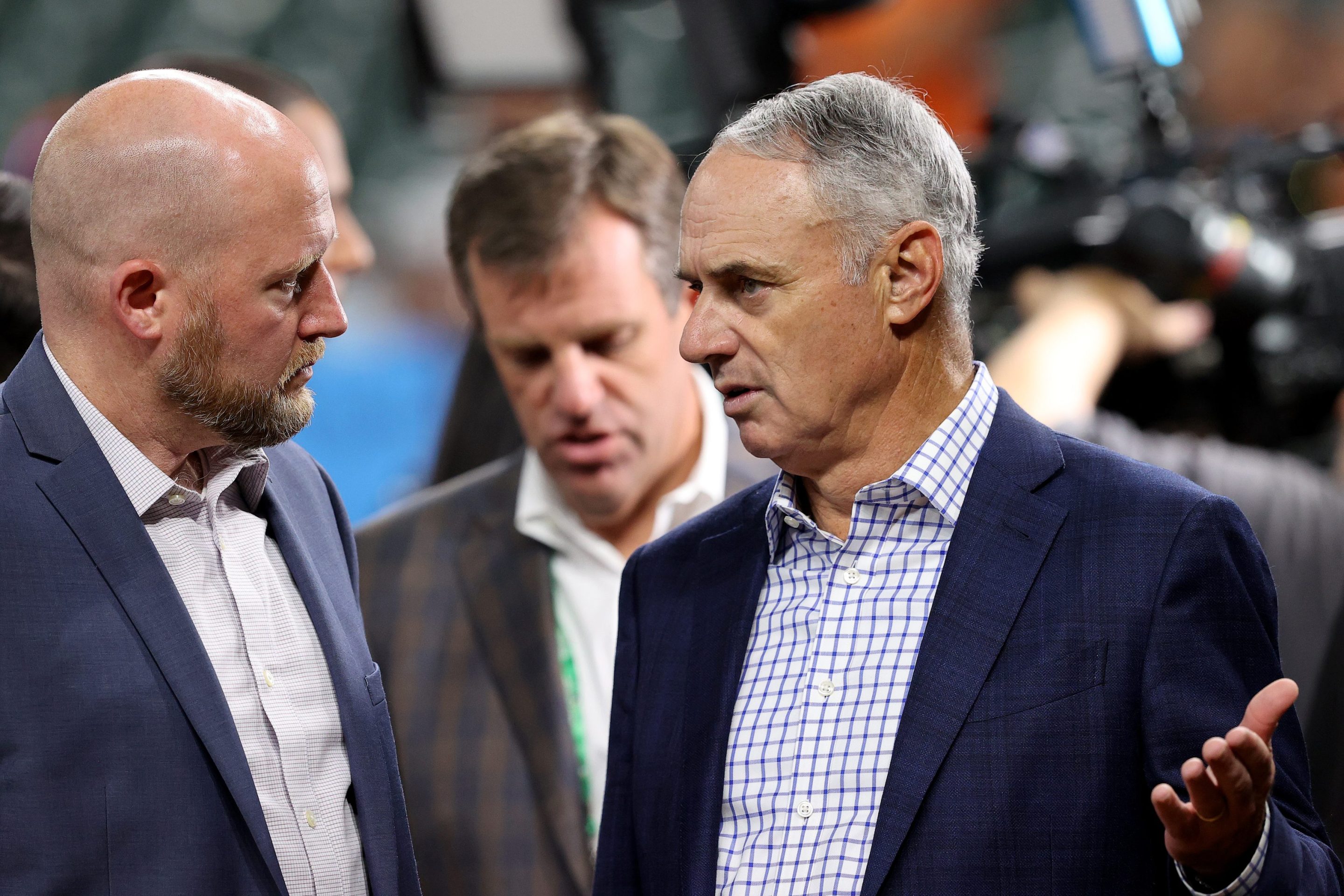 MLB Commissioner Rob Manfred talks to Astros GM James Click during the 2021 World Series.