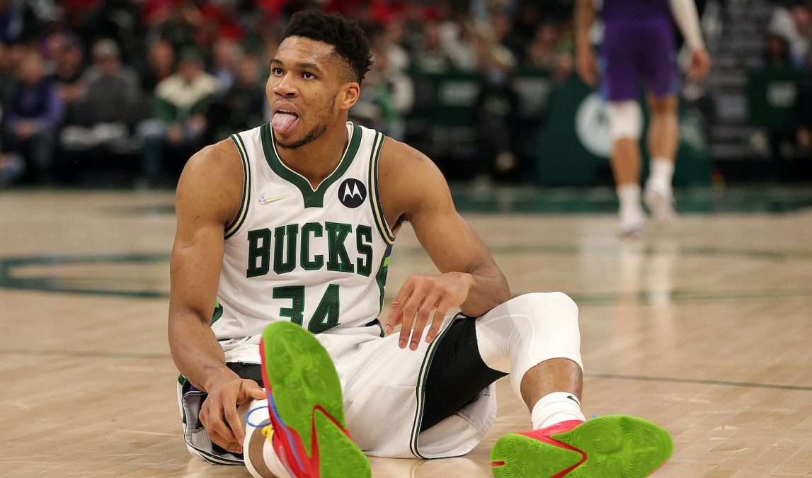 MILWAUKEE, WISCONSIN - DECEMBER 01: Giannis Antetokounmpo #34 of the Milwaukee Bucks reacts after being fouled during the second half of a game against the Charlotte Hornets at Fiserv Forum on December 01, 2021 in Milwaukee, Wisconsin. NOTE TO USER: User expressly acknowledges and agrees that, by downloading and or using this photograph, User is consenting to the terms and conditions of the Getty Images License Agreement. (Photo by Stacy Revere/Getty Images)
