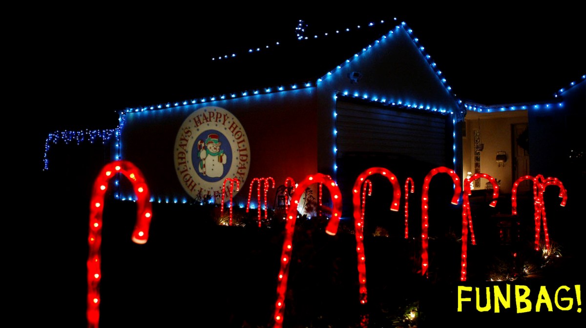 PASADENA, CA, DECEMBER 17: Candy Cane lights and a projected "Happy Holidays" wish adorn a house on December 17, 2003 in Pasadena, California. Many of southern California's better holiday lights displays are in Pasadena. (Photo by David McNew/Getty Images)