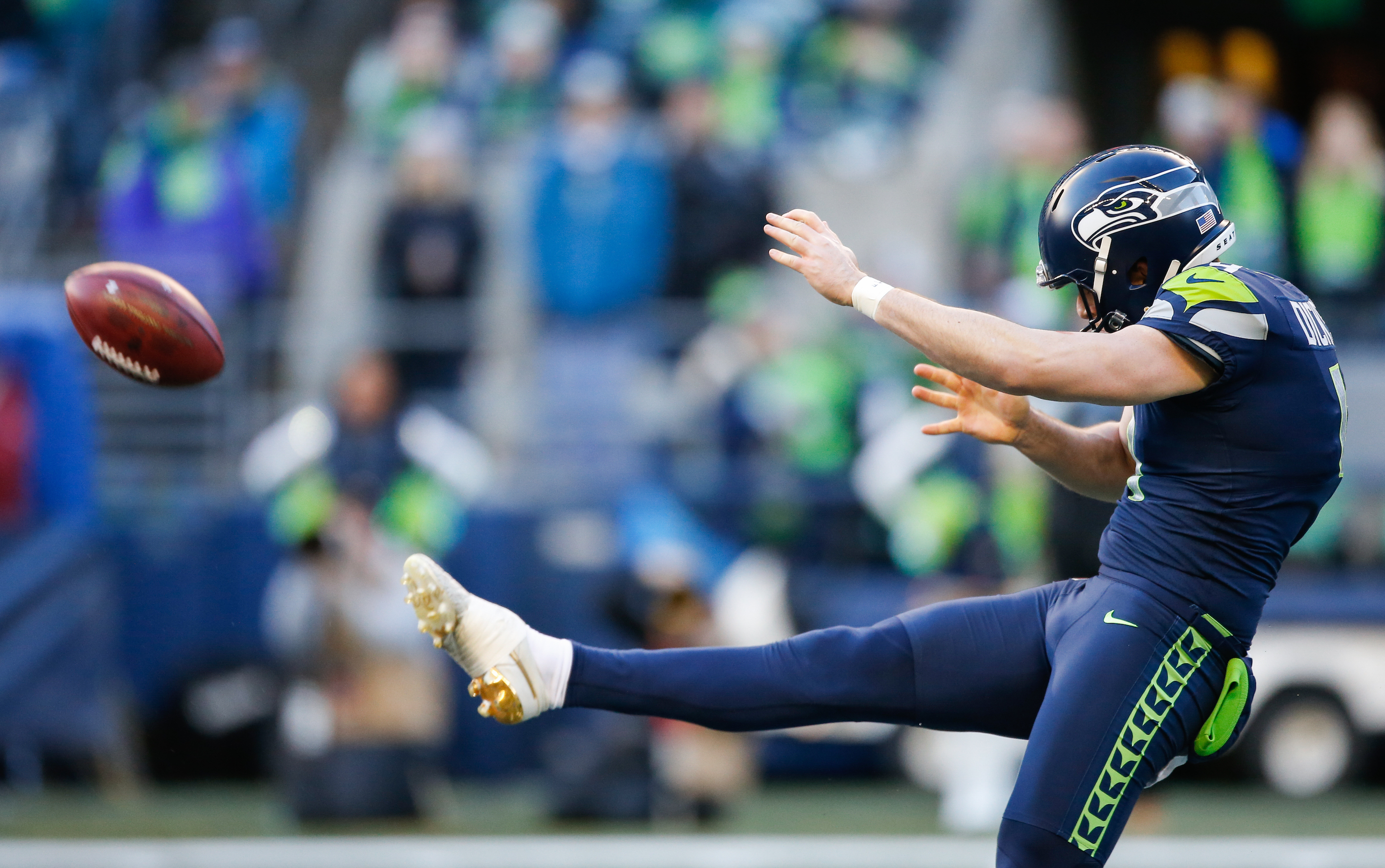 Michael Dickson #4 of the Seattle Seahawks punts the ball in the first half against the Arizona Cardinals at CenturyLink Field on December 30, 2018 in Seattle, Washington.