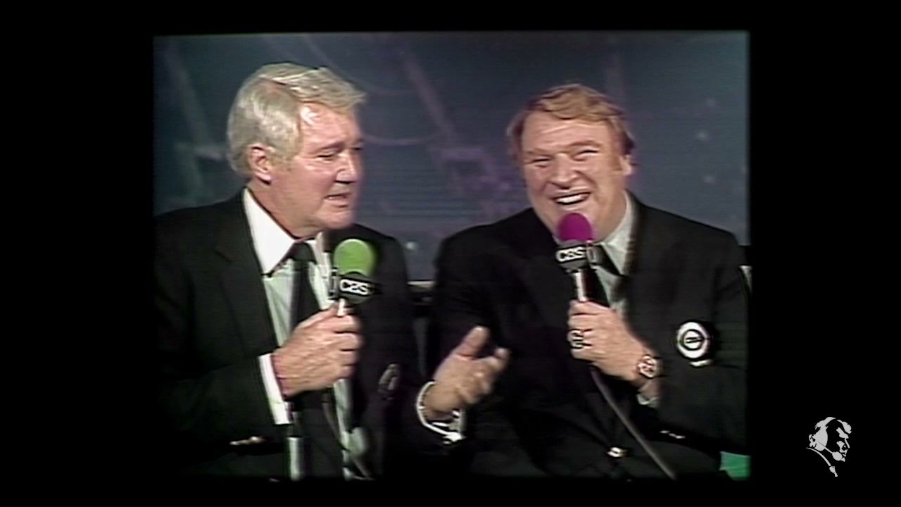 John Madden and Pat Summerall in the booth during a CBS Sports NFL broadcast.