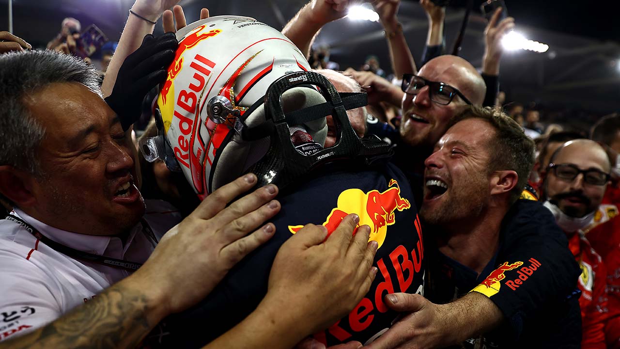 Red Bull driver Max verstappen celebrates with teammates