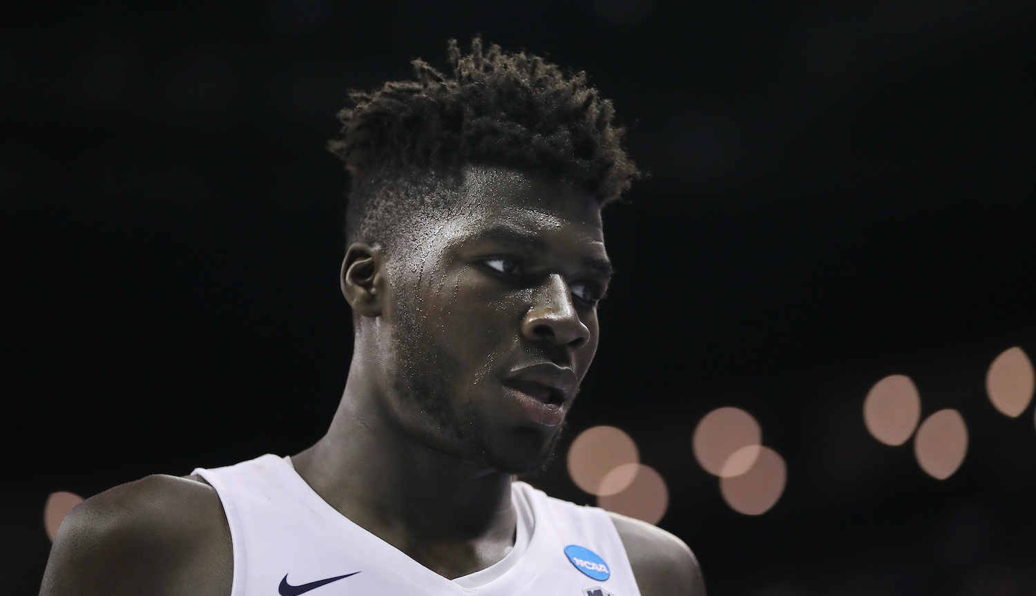 COLUMBUS, OHIO - MARCH 22: Neemias Queta #23 of the Utah State Aggies reacts to their 61-78 loss to the Washington Huskies in the first round of the 2019 NCAA Men's Basketball Tournament at Nationwide Arena on March 22, 2019 in Columbus, Ohio. (Photo by Elsa/Getty Images)
