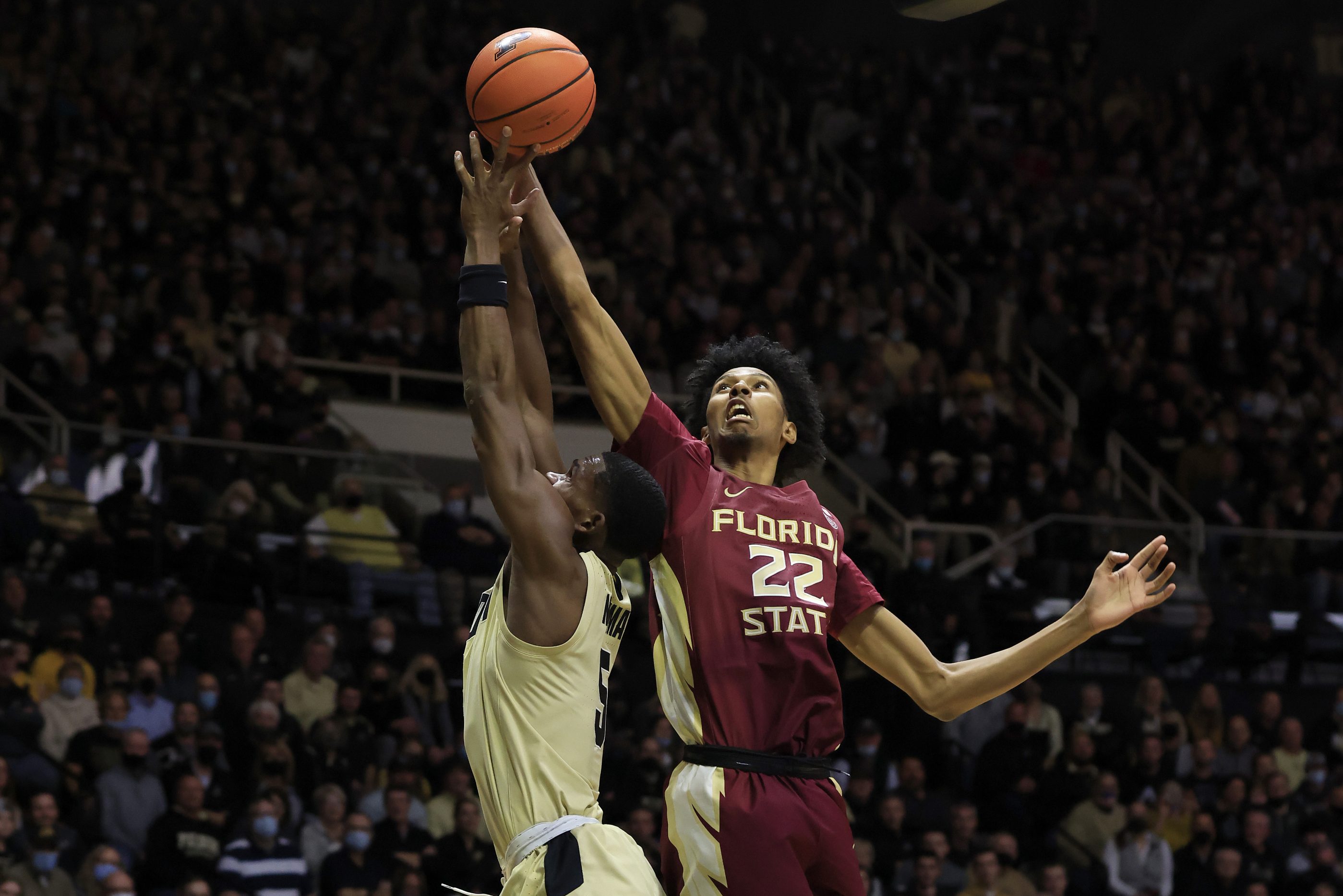 John Butler rebounds the ball