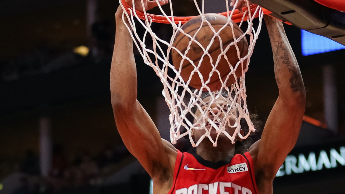 Jalen Green #0 of the Houston Rockets dunks the ball during the first half against the Los Angeles Lakers at Toyota Center on December 28, 2021 in Houston, Texas.