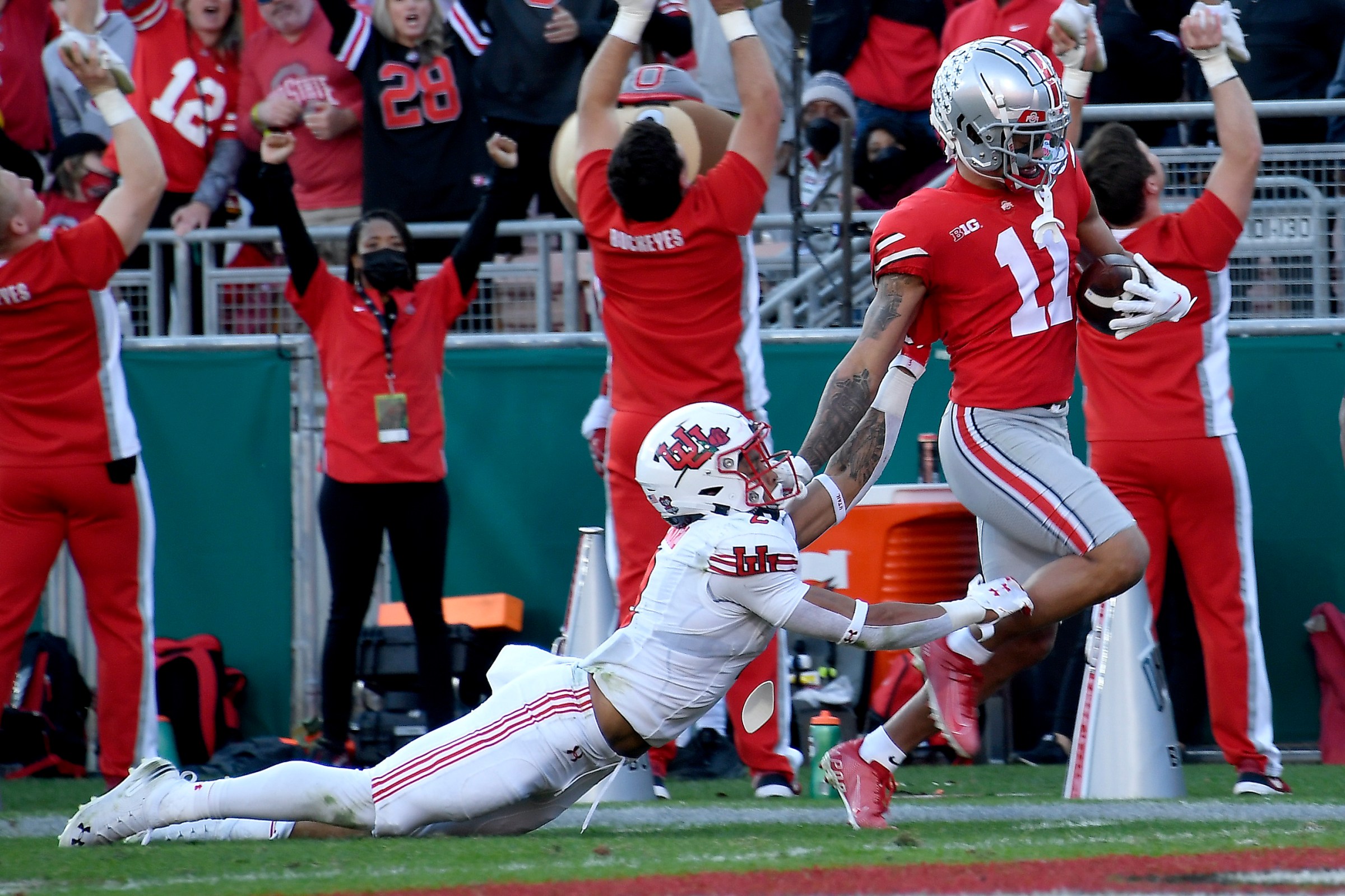Jaxon Smith-Njigba #11 of the Ohio State Buckeyes scores a touchdown against the Utah Utes during the second quarter in the Rose Bowl Game at Rose Bowl Stadium on January 01, 2022 in Pasadena, California.