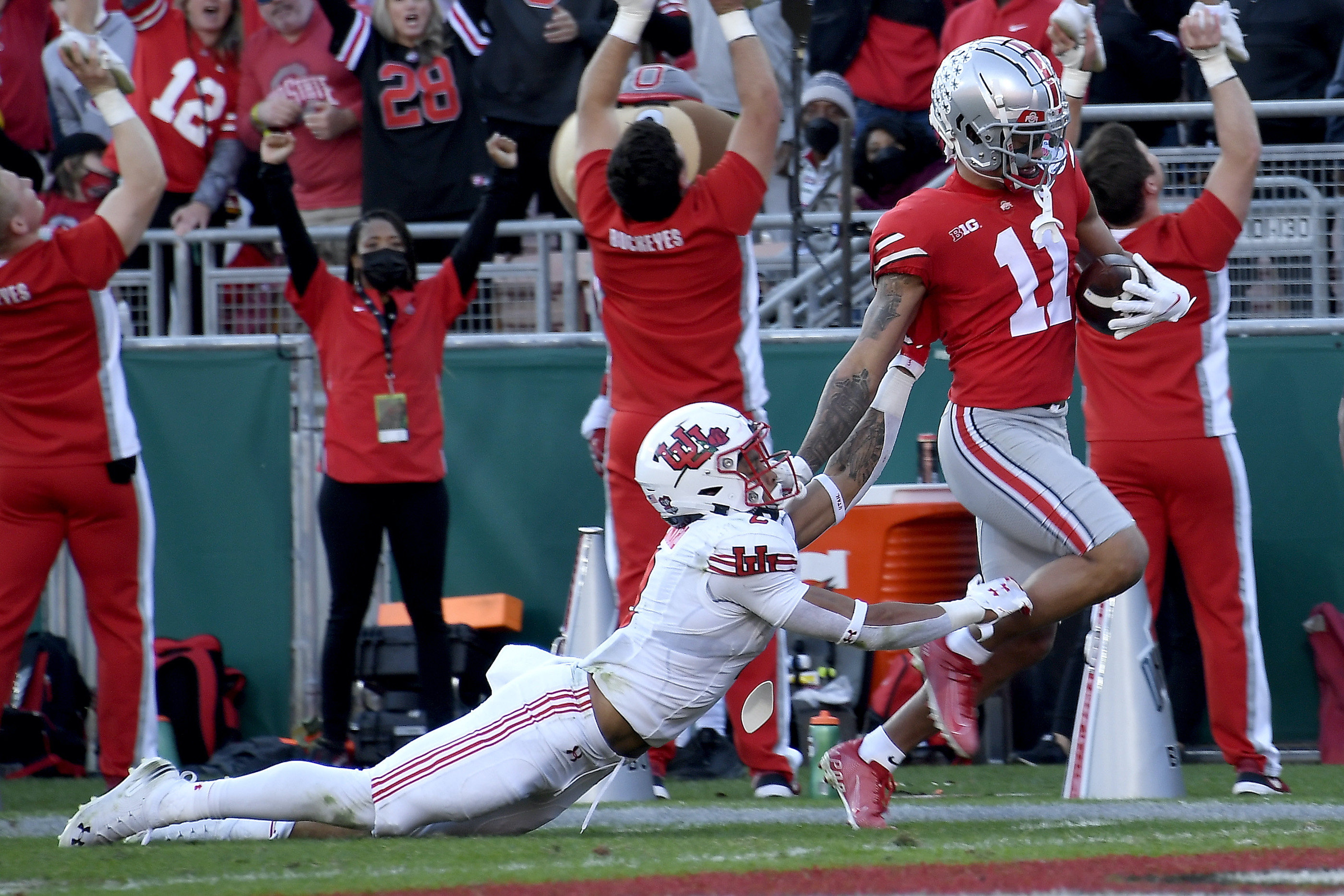 Jaxon Smith-Njigba #11 of the Ohio State Buckeyes scores a touchdown against the Utah Utes during the second quarter in the Rose Bowl Game at Rose Bowl Stadium on January 01, 2022 in Pasadena, California.