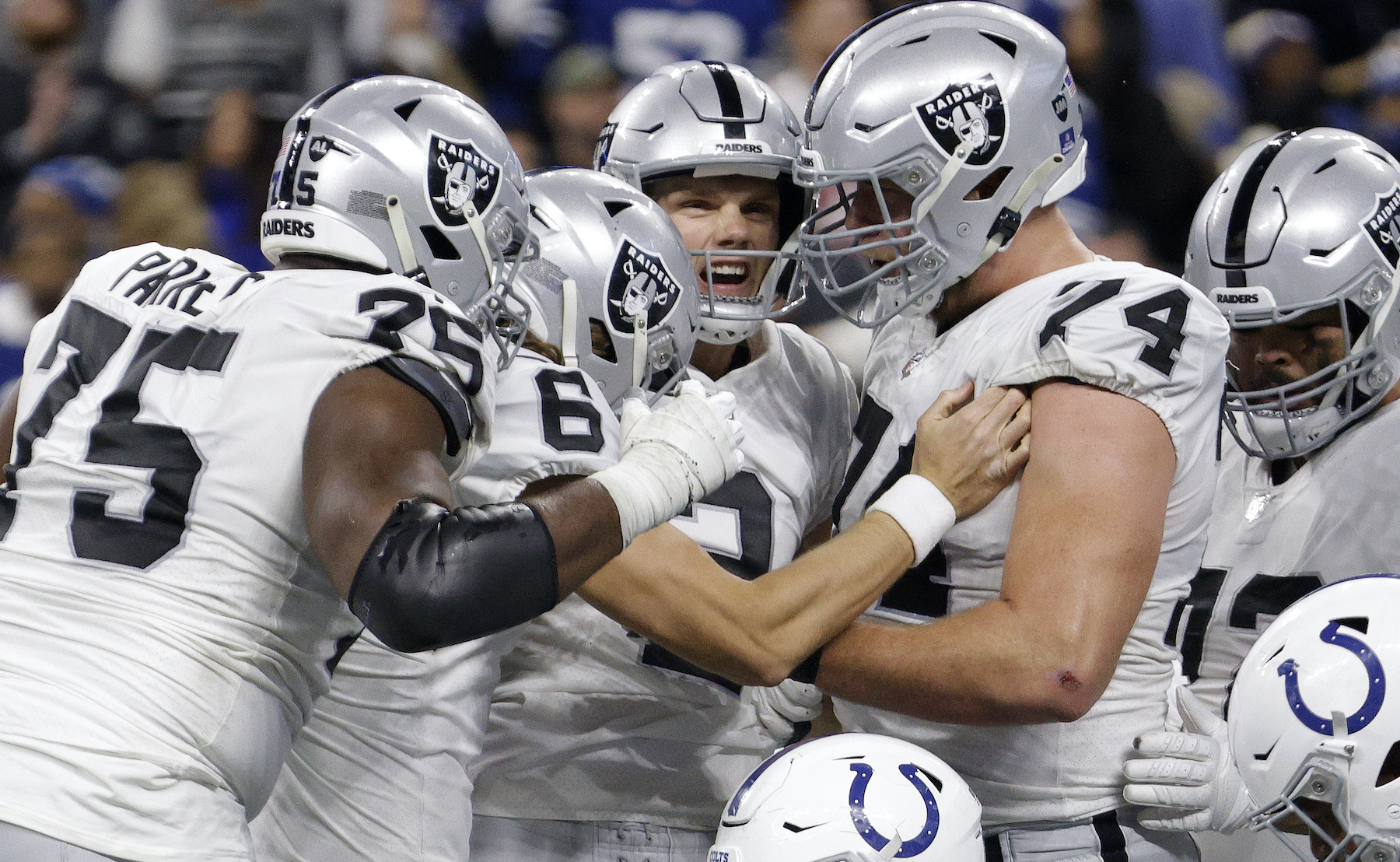 Daniel Carlson #2 of the Las Vegas Raiders celebrates with teammates after kicking a game winning field goal to defeat the Indianapolis Colts 23-20 at Lucas Oil Stadium on January 02, 2022 in Indianapolis, Indiana
