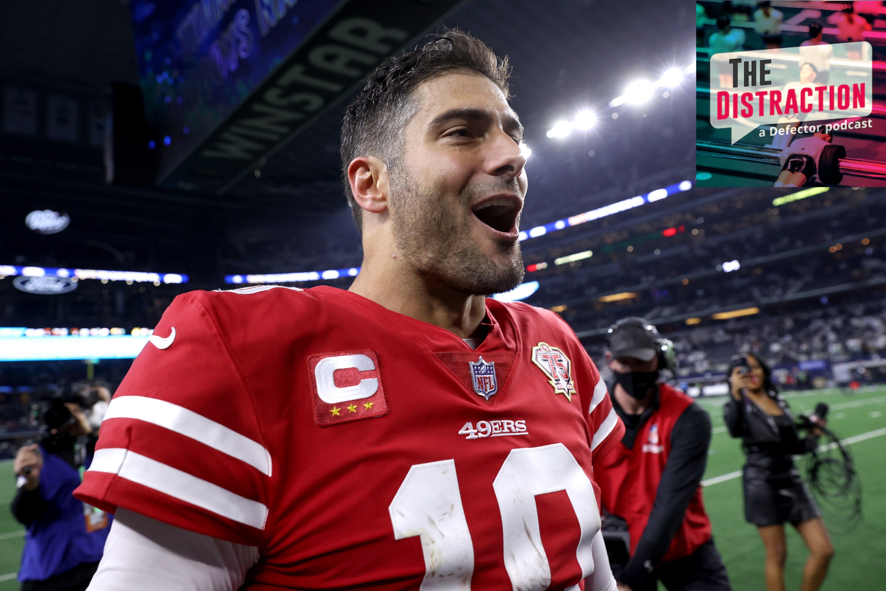 Jimmy Garoppolo celebrates his 49ers' win at Dallas in the Wild Card game.