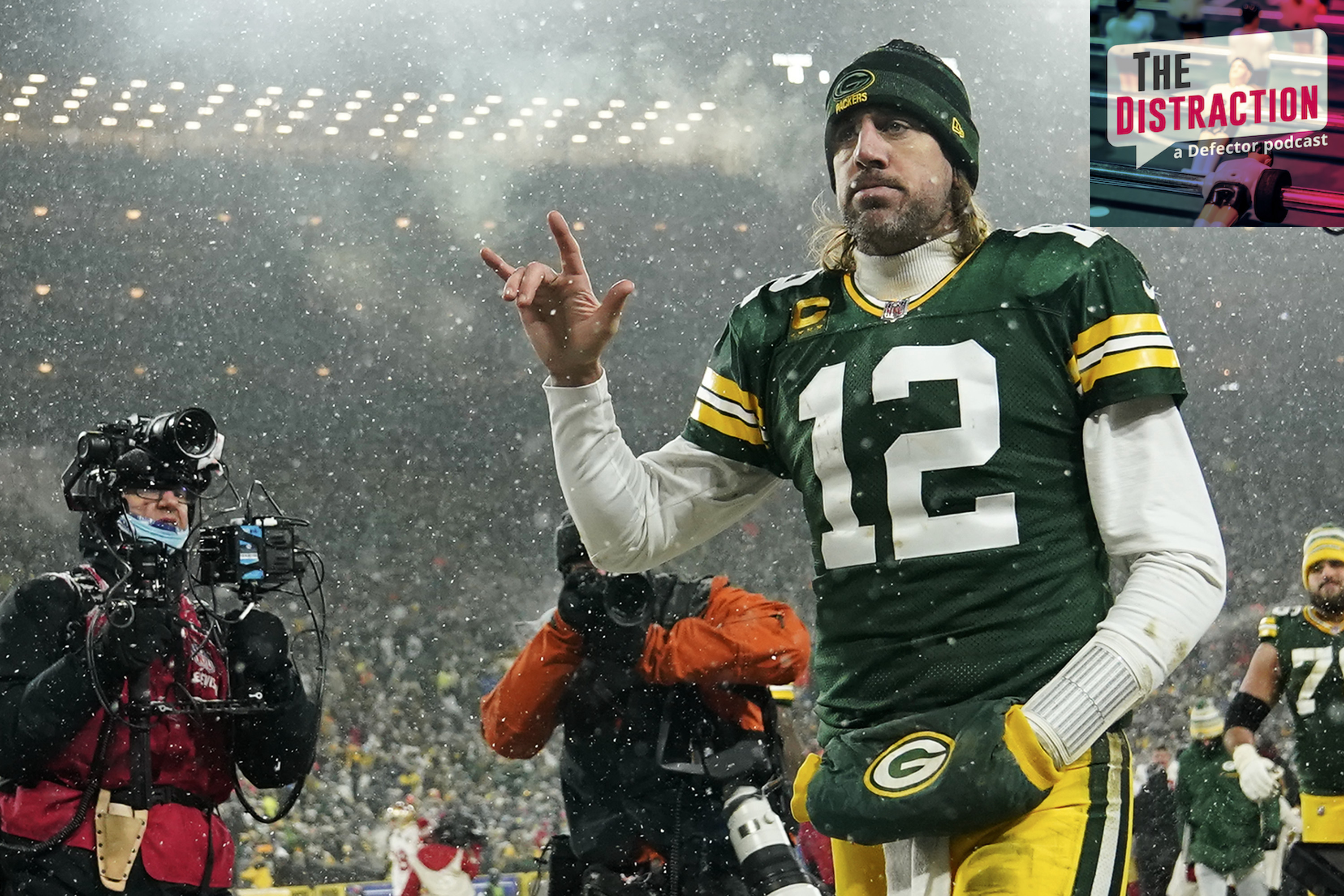 Aaron Rodgers doing some weird stuff with his hand after losing to the 49ers at home in the NFL Playoffs.