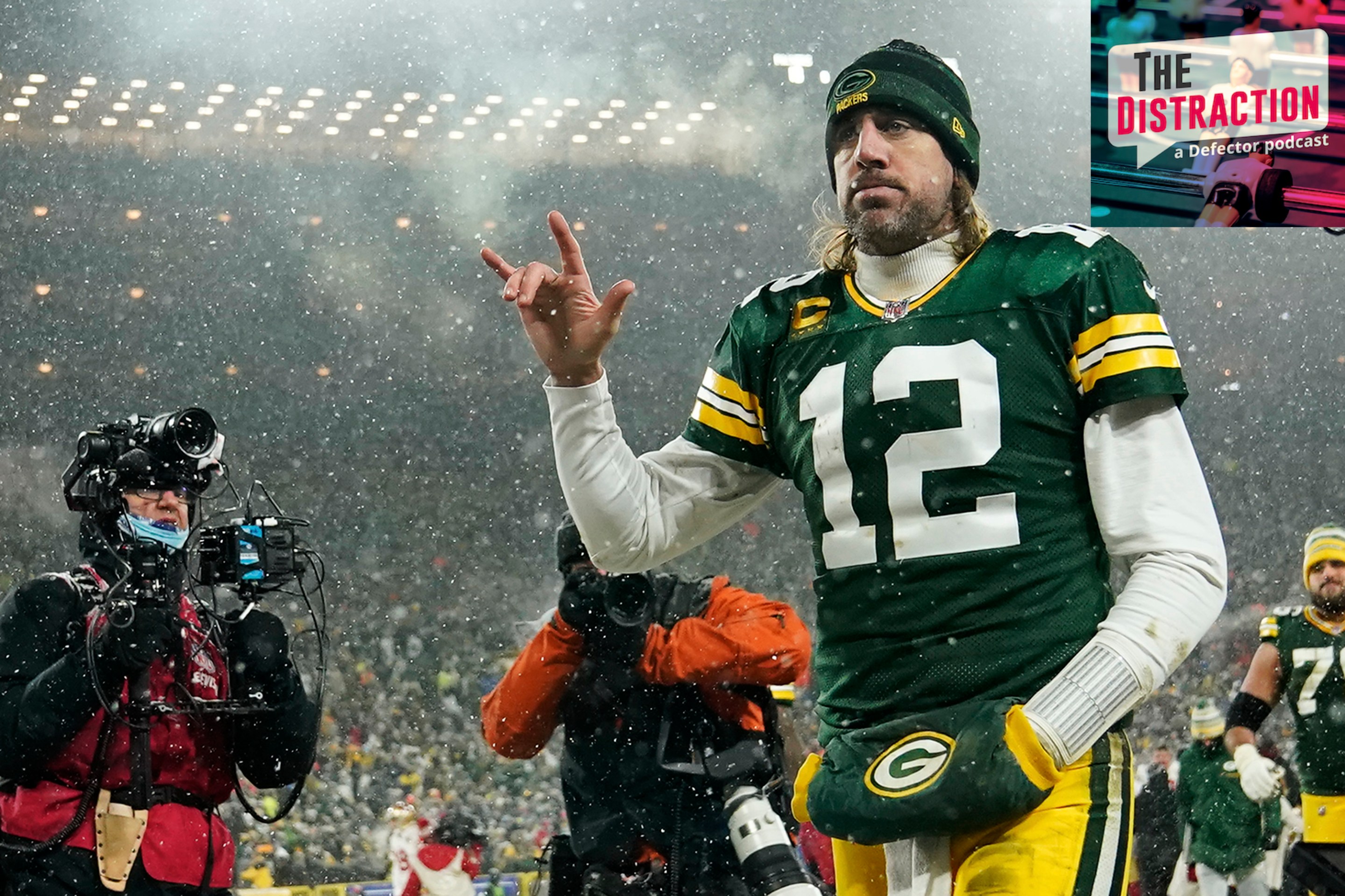 Aaron Rodgers doing some weird stuff with his hand after losing to the 49ers at home in the NFL Playoffs.