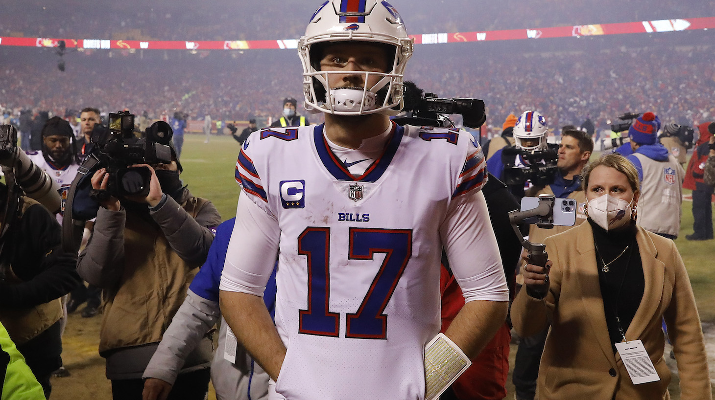 KANSAS CITY, MISSOURI - JANUARY 23: Josh Allen #17 of the Buffalo Bills walks off the field after being defeated by the Kansas City Chiefs 42-36 in the AFC Divisional Playoff game at Arrowhead Stadium on January 23, 2022 in Kansas City, Missouri. (Photo by David Eulitt/Getty Images)