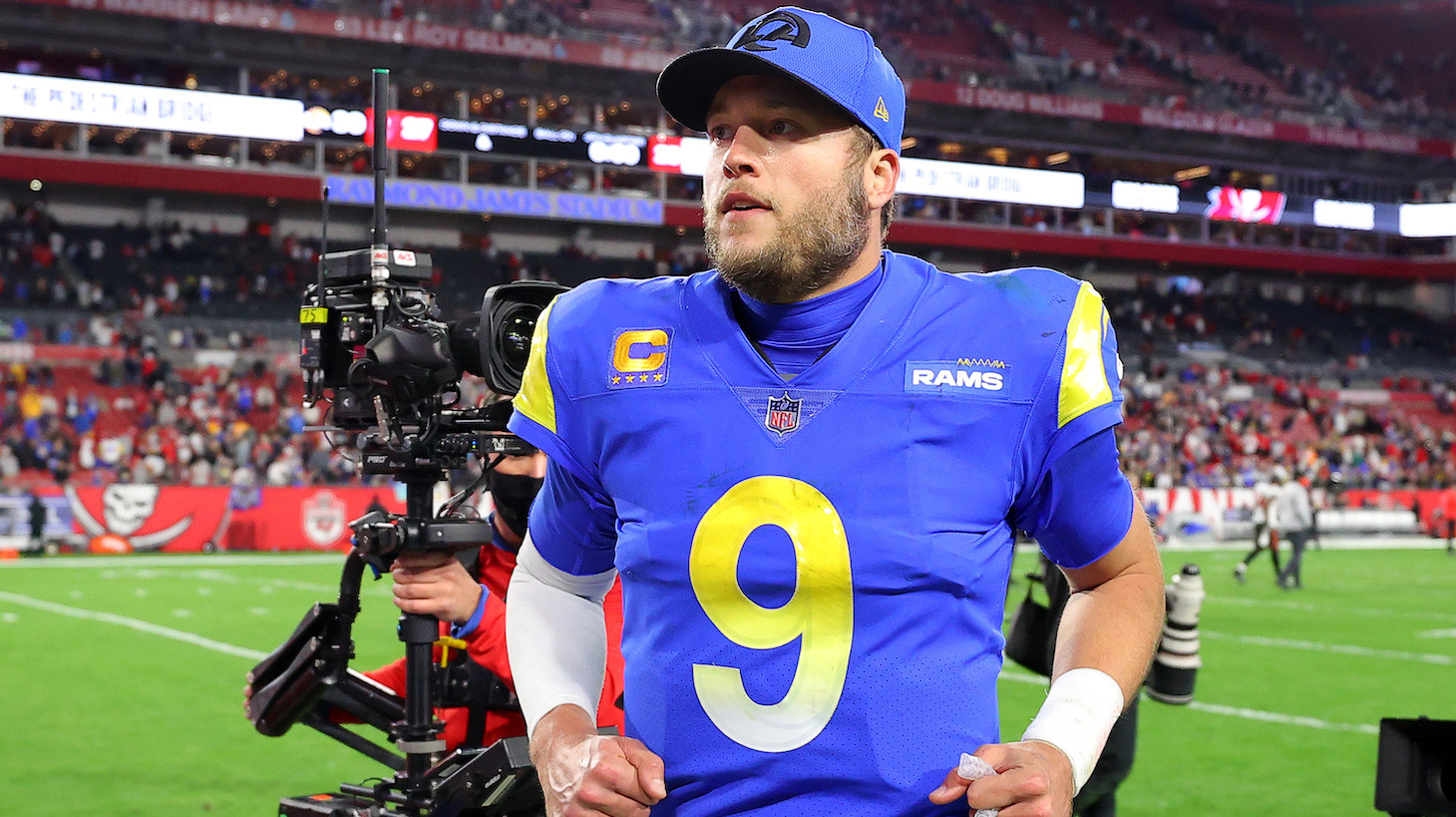 TAMPA, FLORIDA - JANUARY 23: Matthew Stafford #9 of the Los Angeles Rams runs off the field after defeating the Tampa Bay Buccaneers 30-27 in the NFC Divisional Playoff game at Raymond James Stadium on January 23, 2022 in Tampa, Florida. (Photo by Kevin C. Cox/Getty Images)