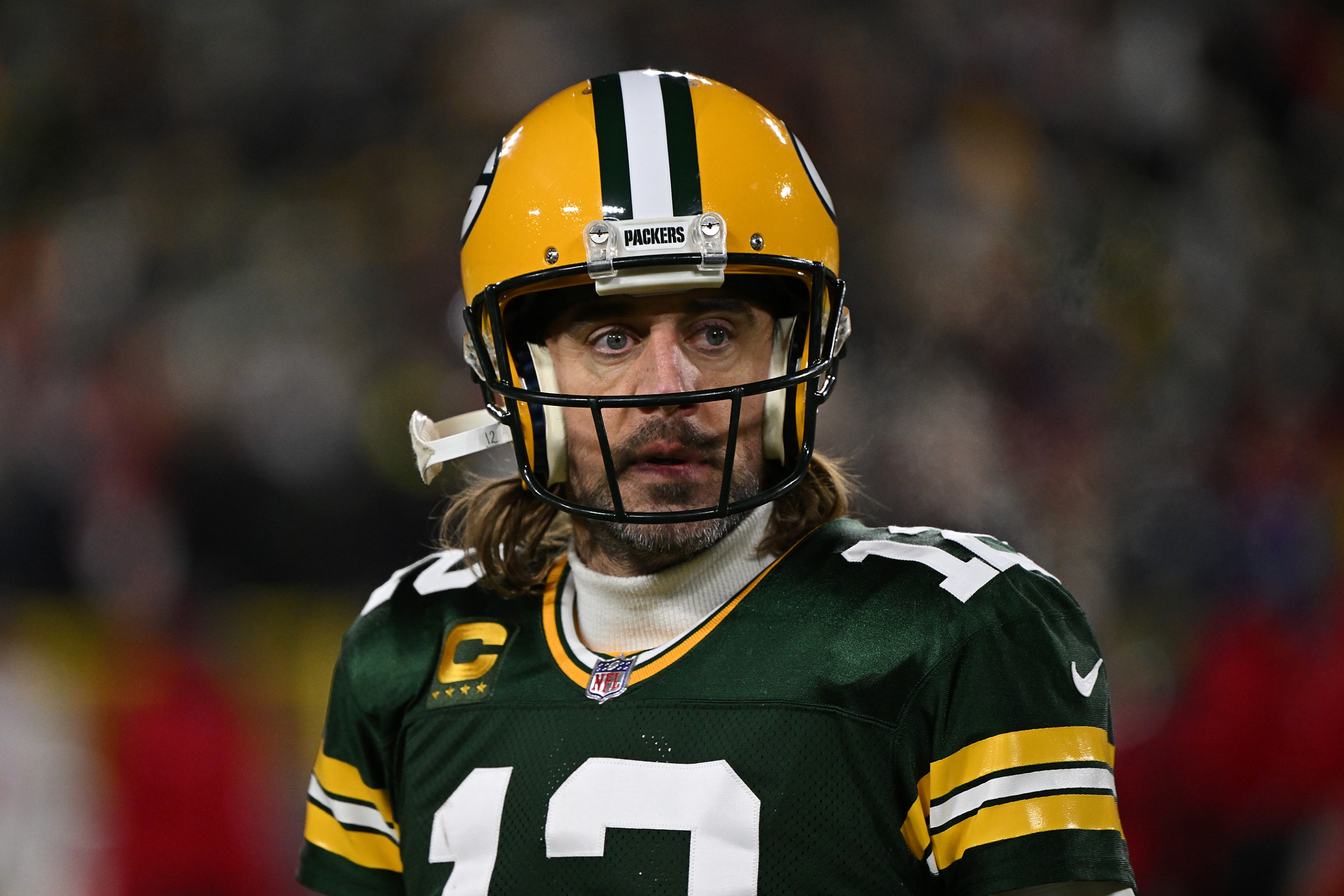 Aaron Rodgers, seen here on the field thinking freely during his Packers' loss to the 49ers in the NFC Divisional Round.