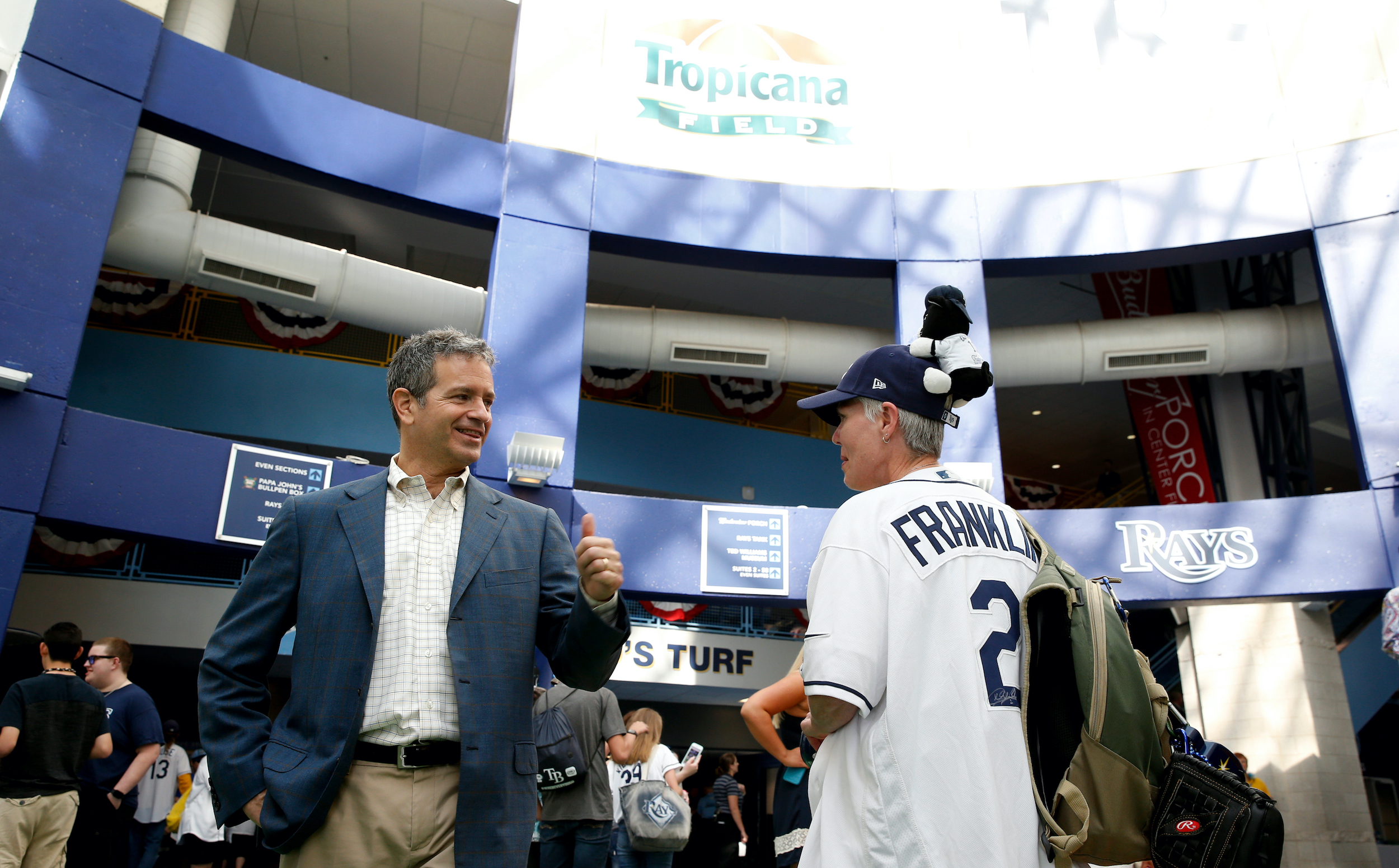 Tampa Bay Rays owner Stuart Sternberg greets baseball fans as they arrive for the first game of the season on Opening Day before the start of a game between the Rays and the New York Yankees on April 2, 2017 at Tropicana Field in St. Petersburg, Florida.