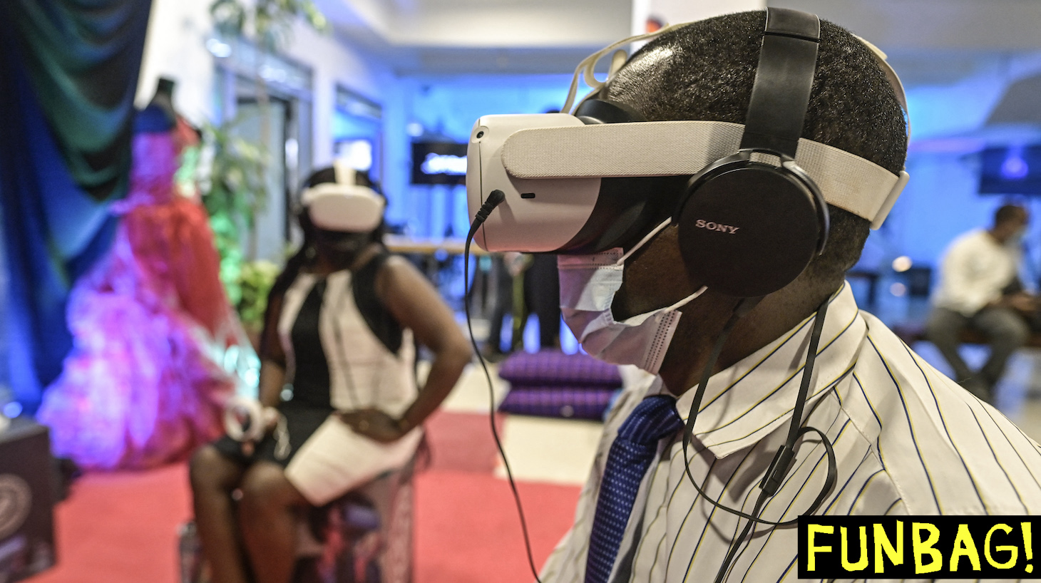 Attendee uses a virtual-reality headset, at the VR/360° Filmmaking Masterclass For Women- Industry Night on January 28, 2022 in Nairobi. - The VR/360° Filmmaking Masterclass For Women is dedicated to strengthening the creative economy in different sectors in Kenya. The project consists mainly of training & workshops for creatives and related events. (Photo by Simon MAINA / AFP) (Photo by SIMON MAINA/AFP via Getty Images)