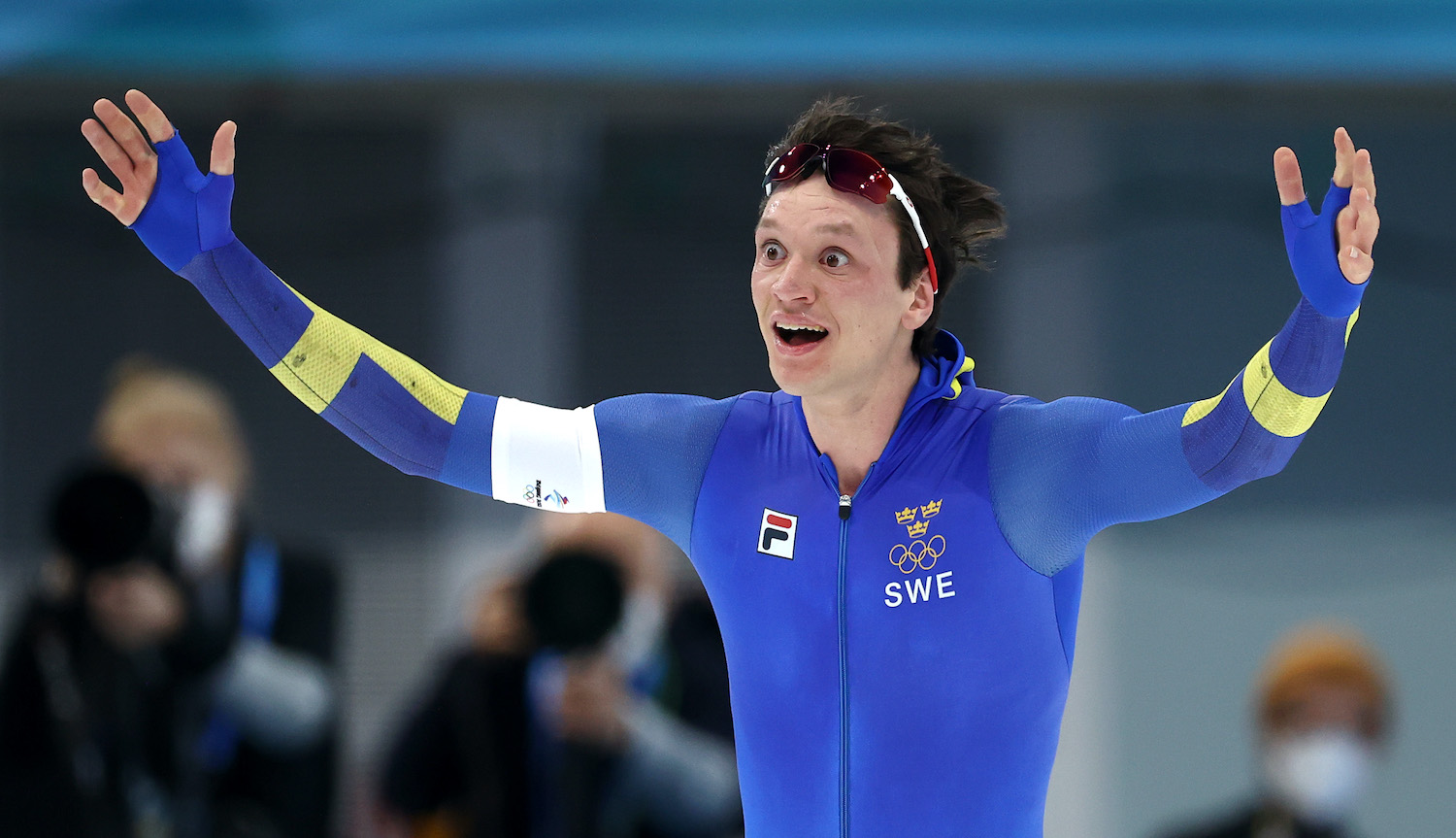 BEIJING, CHINA - FEBRUARY 06: Nils van der Poel of Team Sweden celebrates winning the Gold Medal and setting a new Olympic record time of 6:08.84 during the Men's 5000m on day two of the Beijing 2022 Winter Olympic Games at National Speed Skating Oval on February 06, 2022 in Beijing, China. (Photo by Dean Mouhtaropoulos/Getty Images)