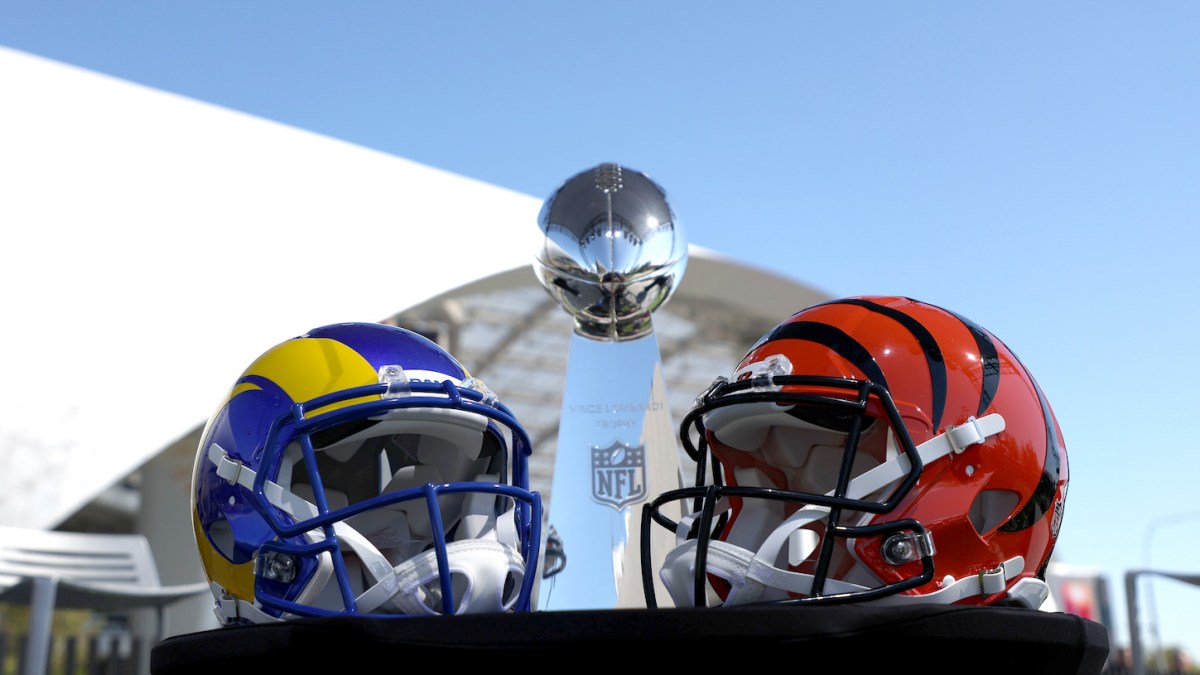 The Lombardi Trophy, with LA Rams and Cincinnati Bengals helmets