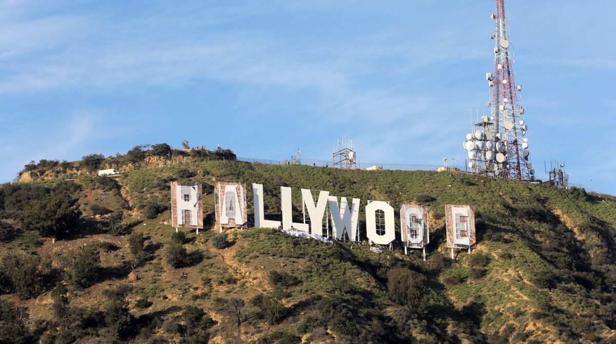 LOS ANGELES, CALIFORNIA - FEBRUARY 14: The Hollywood Sign changes to honor the Los Angeles Rams winning Super Bowl LVI on February 14, 2022 in Los Angeles, California. (Photo by Kevin Winter/Getty Images)
