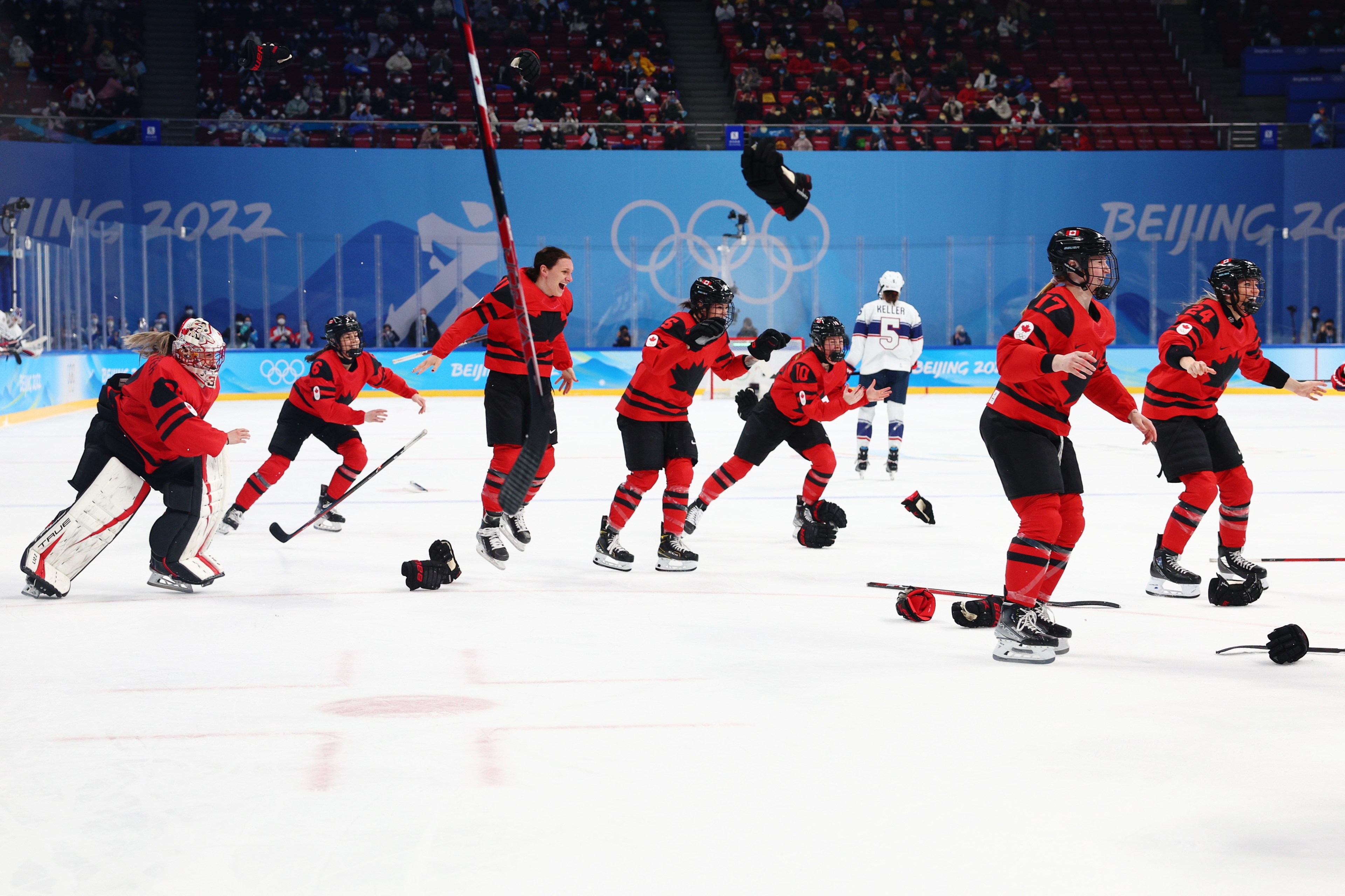 Team Canada reacts after defeating Team United States in the Women's Ice Hockey Gold Medal match between Team Canada and Team United States on Day 13 of the Beijing 2022 Winter Olympic Games at Wukesong Sports Centre on February 17, 2022 in Beijing, China.