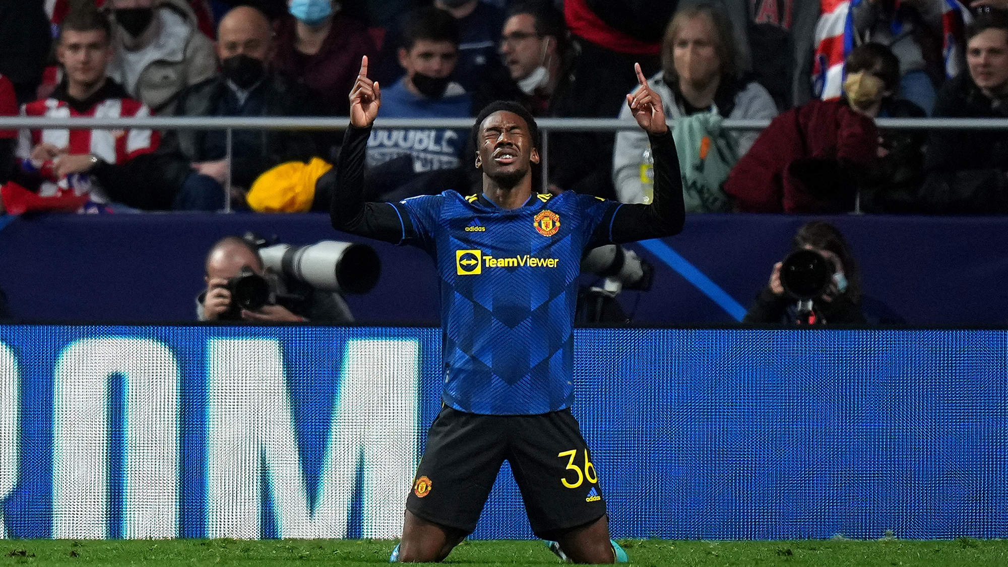 Anthony Elanga of Manchester United celebrates after scoring their team's first goal during the UEFA Champions League Round Of Sixteen Leg One match between Atletico Madrid and Manchester United at Wanda Metropolitano on February 23, 2022 in Madrid, Spain.