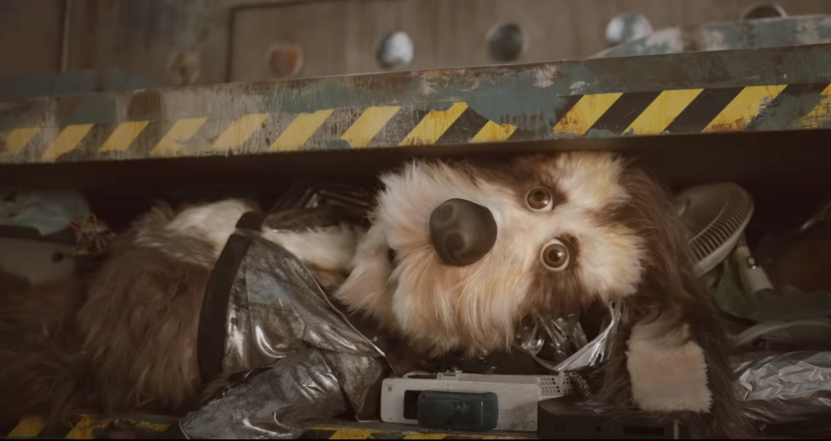An animatronic dog about to be crushed into oblivion in Meta's upsetting Super Bowl ad.