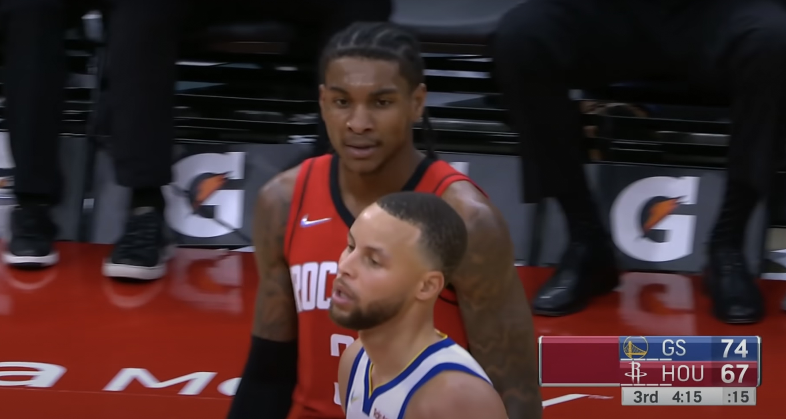 Kevin Porter Jr. stares at Steph Curry