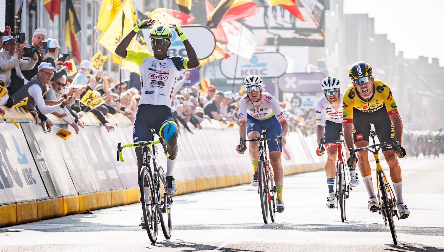 Eritrean Biniam Girmay Hailu of Intermarche Wanty-Gobert Materiaux celebrates after winning the men's Gent-Wevelgem - In Flanders Fields cycling race, 248,9km from Ieper to Wevelgem, Sunday 27 March 2022. BELGA PHOTO KURT DESPLENTER (Photo by KURT DESPLENTER / BELGA MAG / Belga via AFP) (Photo by KURT DESPLENTER/BELGA MAG/AFP via Getty Images)
