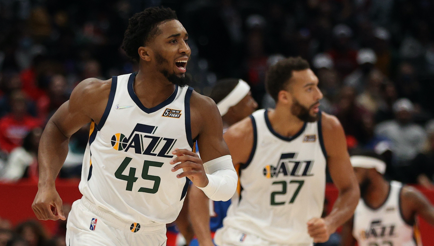 WASHINGTON, DC - DECEMBER 11: Donovan Mitchell #45 of the Utah Jazz reacts after scoring against the Washington Wizards during the first half at Capital One Arena on December 11, 2021 in Washington, DC. NOTE TO USER: User expressly acknowledges and agrees that, by downloading and or using this photograph, User is consenting to the terms and conditions of the Getty Images License Agreement. (Photo by Patrick Smith/Getty Images)
