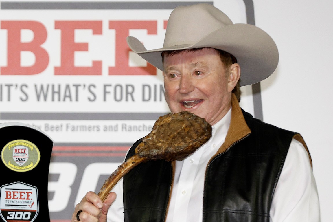 NASCAR's Richard Childress holding a tomahawk ribeye like a big dumbass