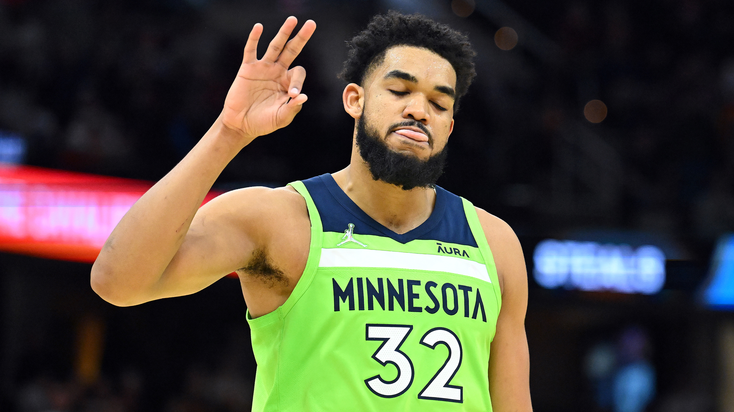 Karl-Anthony Towns #32 of the Minnesota Timberwolves celebrates after scoring during the fourth quarter against the Cleveland Cavaliers at Rocket Mortgage Fieldhouse on February 28, 2022 in Cleveland, Ohio.