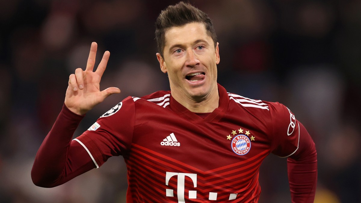 Robert Lewandowski of FC Bayern Muenchen celebrates after scoring their team's third goal during the UEFA Champions League Round Of Sixteen Leg Two match between Bayern München and FC Salzburg at Football Arena Munich on March 08, 2022 in Munich, Germany
