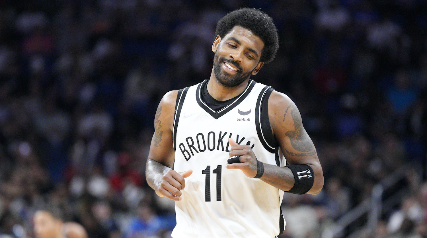 ORLANDO, FLORIDA - MARCH 15: Kyrie Irving #11 of the Brooklyn Nets reacts after scoring against the Orlando Magic in the second half at Amway Center on March 15, 2022 in Orlando, Florida. NOTE TO USER: User expressly acknowledges and agrees that, by downloading and or using this photograph, User is consenting to the terms and conditions of the Getty Images License Agreement. (Photo by Mark Brown/Getty Images)