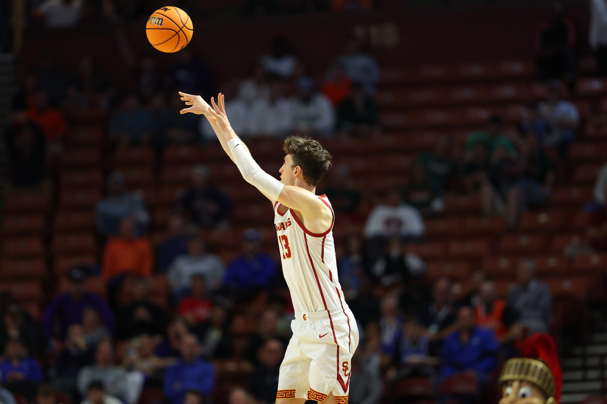 Drew Peterson of USC scores a three pointer