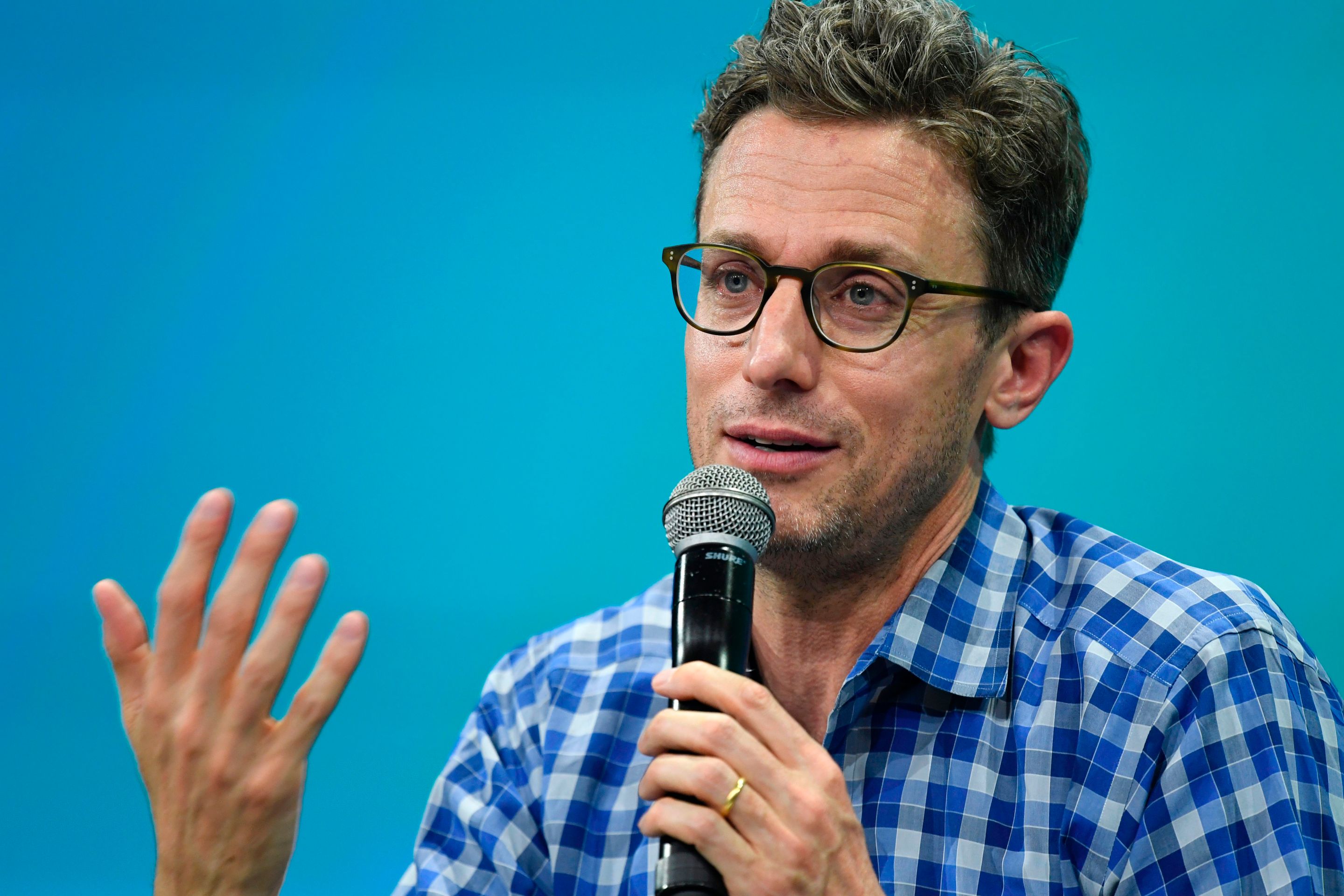 Founder and Chief Executive Officer (CEO) Buzzfeed Jonah Peretti gestures as he speaks during a session at The Viva Technology Event in Paris on June 15, 2017. / AFP PHOTO / BERTRAND GUAY