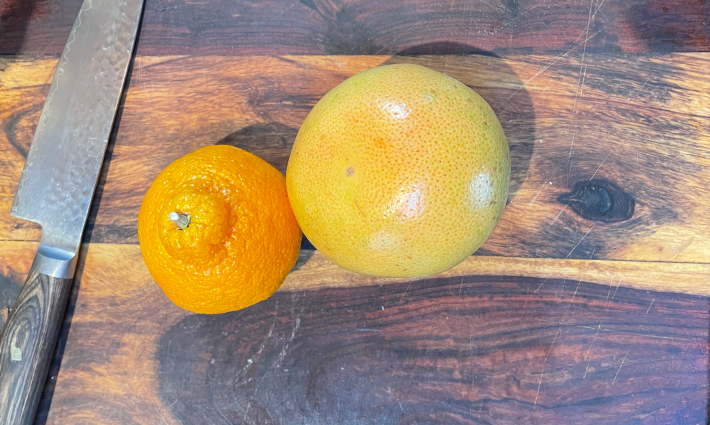 An orange and a grapefruit