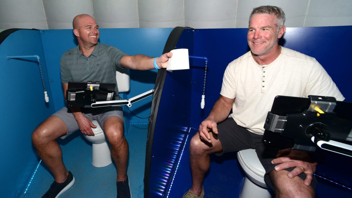 Brett Favre seated on a toilet next to Matt Hasselbeck as part of something called "All-Stars Drop By Poo-Pourri"