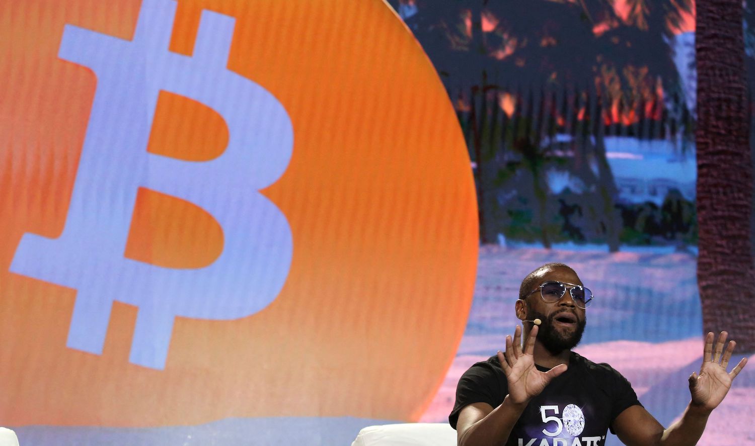 Former world welterweight king Floyd Mayweather speaks on stage during the crypto-currency conference Bitcoin 2021 Convention at the Mana Convention Center in Miami, Florida, on June 4, 2021. (Photo by Marco BELLO / AFP) (Photo by MARCO BELLO/AFP via Getty Images)